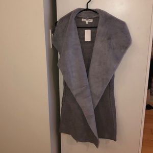 Mid length faux shearling vest